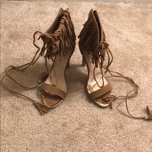 Lace up fringe heels